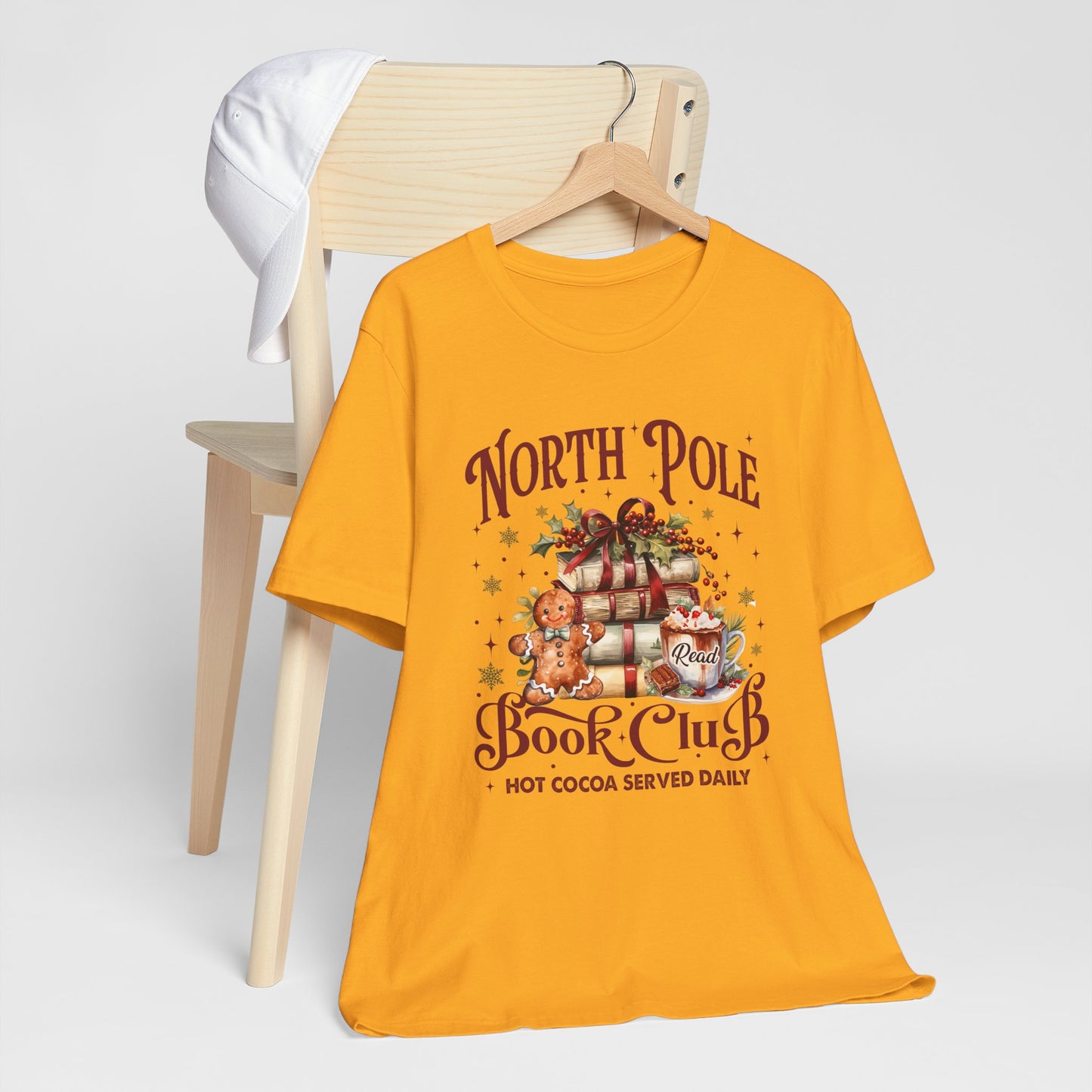 North Pole Book Club Unisex Jersey Short Sleeve Tee - size S - 3X