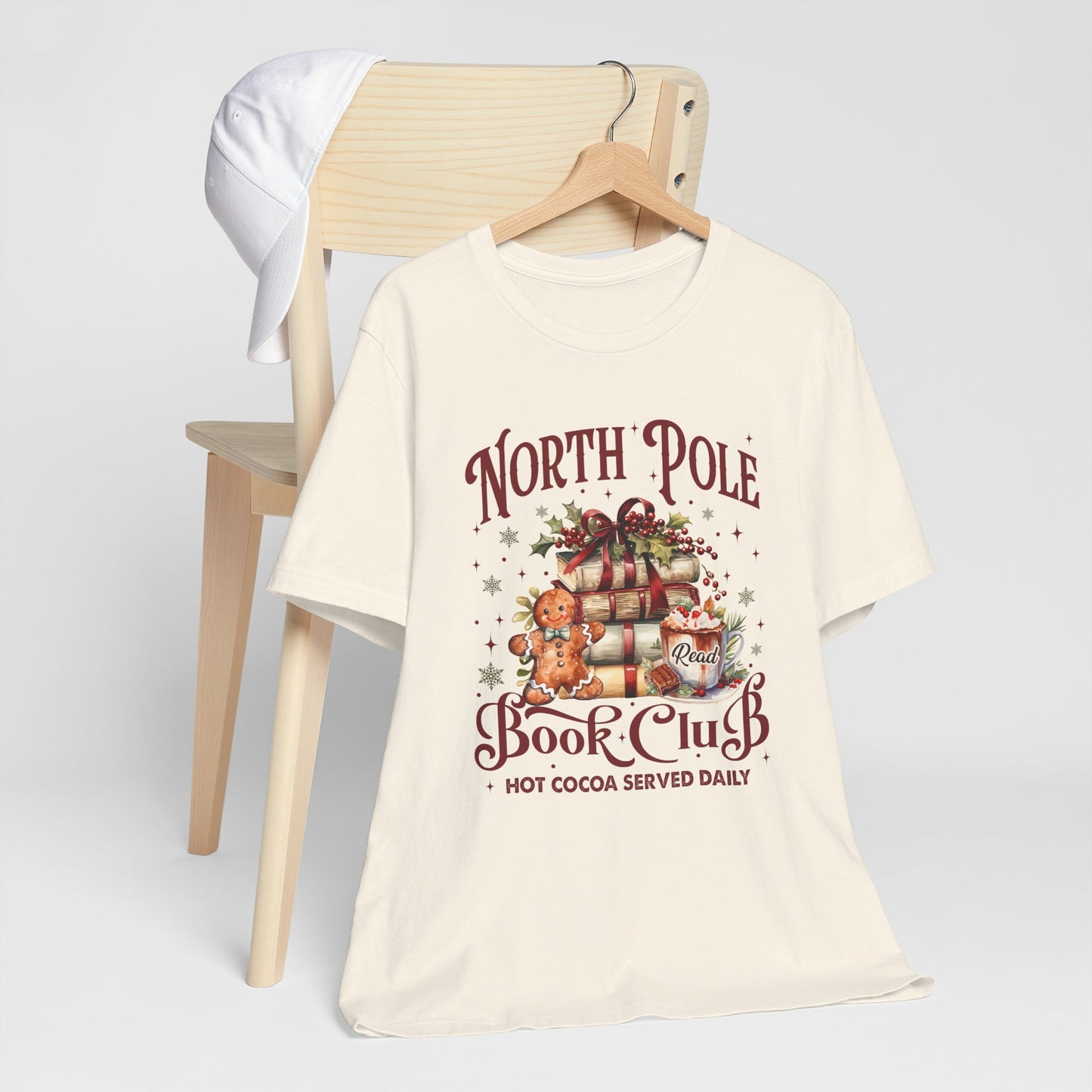 North Pole Book Club Unisex Jersey Short Sleeve Tee - size S - 3X